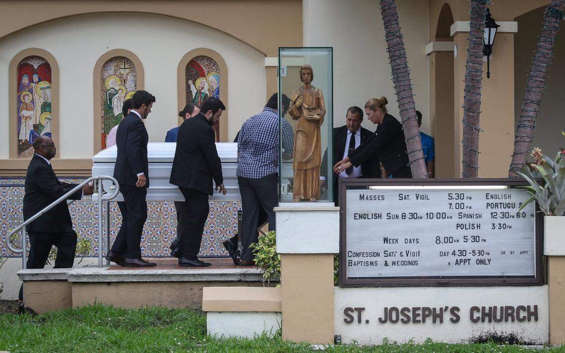 Pallbearers escort the shared casket of sisters Lucia, 10, and Emma Guara, 4, into St. Joseph Catholic Church in Miami Beach for the funeral Mass for the four members of the Guara family - Marcus Guara, 52, Anaely Rodriguez, 42, and their two daughters - Lucia and Emma - on Tuesday, July 6, 2021. The family was killed in the collapse of the Champlain Towers condo building in Surfside, Florida, on June 24, 2021.