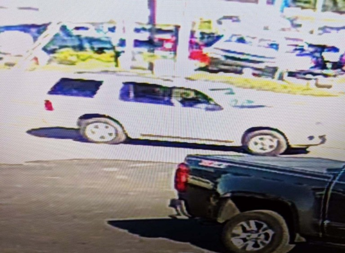 A picture of the white Ford Explorer or Expedition that the FBI says the ‘Traveling Bandit’ may be driving.