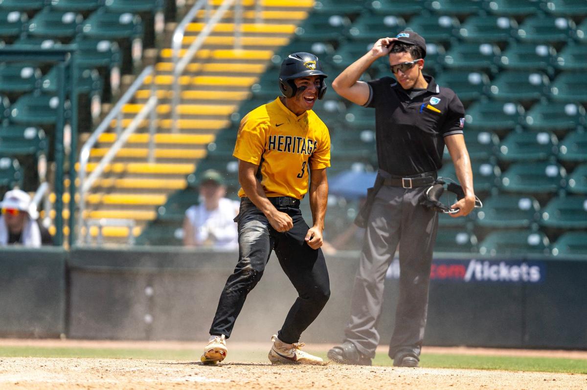 American Heritage base runner RJ Machado (3) reacts to scoring the winning run during the Class 5A state semifinal game against Tallahassee Lincoln at Hammond Stadium on Friday, May 17, 2024, in Fort Myers, Fla.