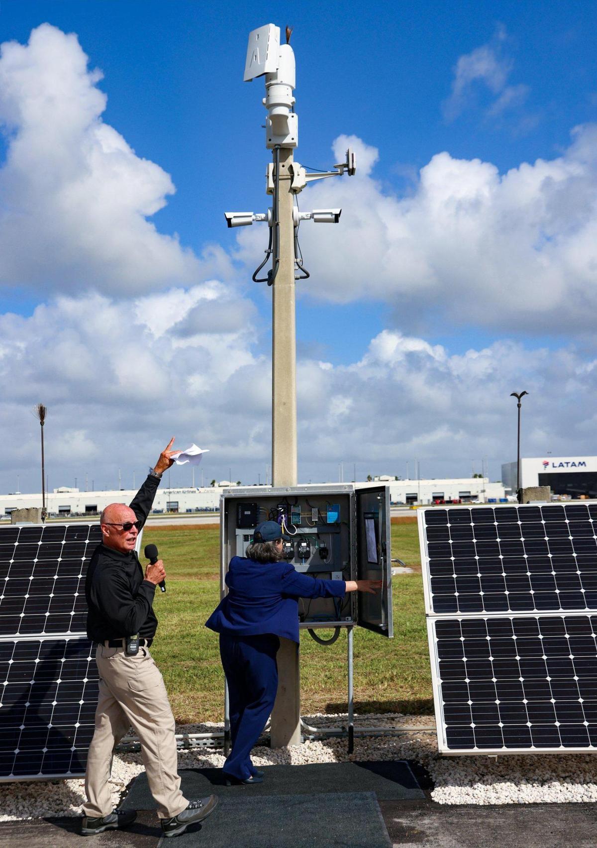 Jim Bamberger of Homeland Security points to the camera and how it locks on the source of intrusion (Mayor Daniella Levine Cava) during a live airfield demonstration of Miami International Airport’s new perimeter intrusion detection system on Tuesday, October 22, 2024, in Miami, Florida. .