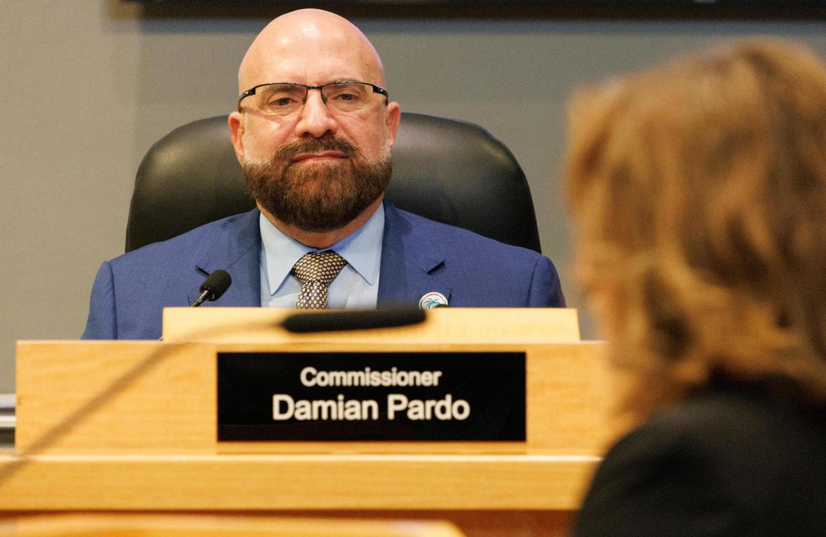 Commissioner Damian Pardo listens during the public comment period of a Miami City Commission meeting on Thursday, July 10, 2025 at Miami City Hall in Coconut Grove.