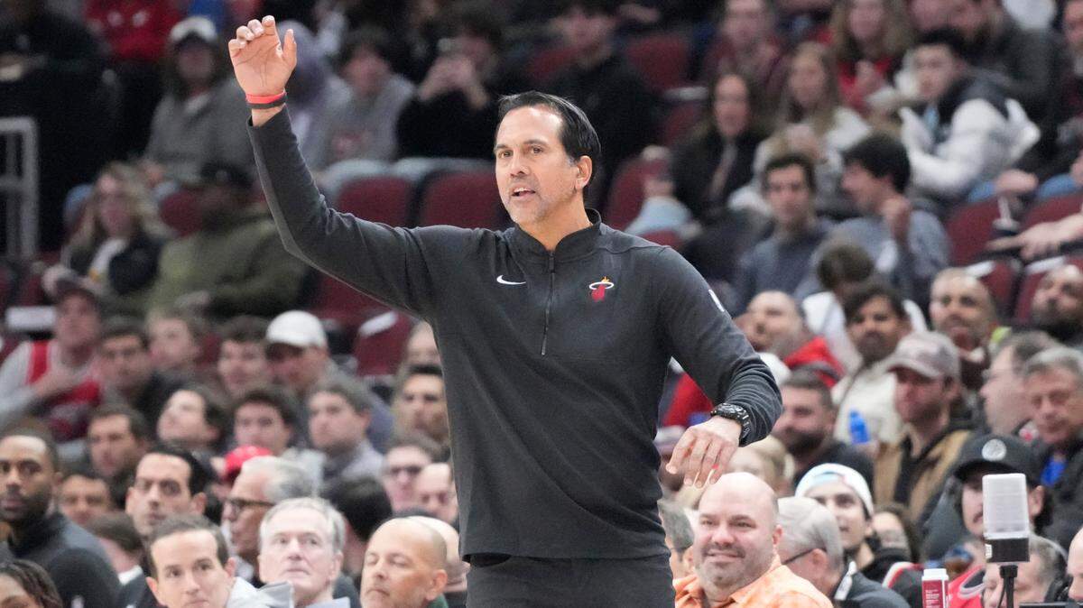 Miami Heat head coach Erik Spoelstra gestures to his team against the Chicago Bulls during the first quarter at United Center.
