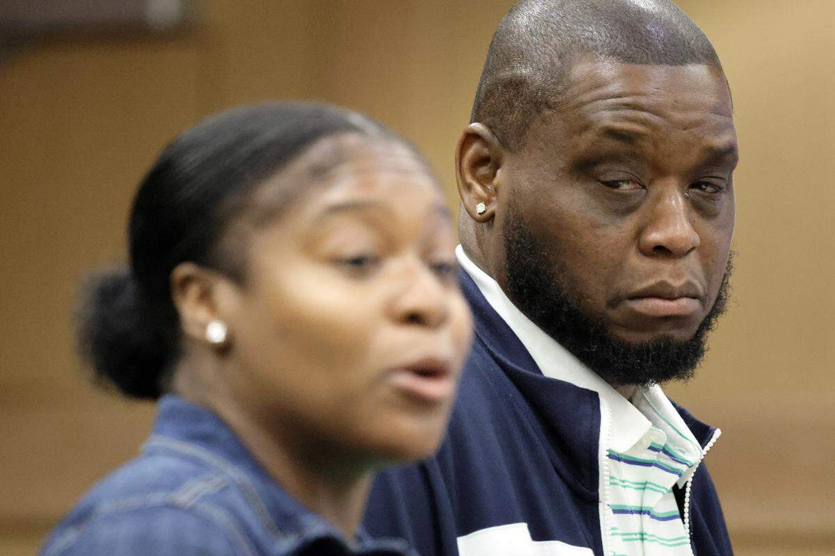 Rickey Ferguson Sr., looks on as his sister Michelle Beckford gives a victim’s impact statement about her nephew and Ferguson’s son, Rickey Ferguson Jr., during a change-of-plea hearing and sentencing of Keantae Vaughn, 17, at the Broward County Courthouse in Fort Lauderdale on Monday, Jan. 12, 2026. Vaughn received a sentence of 25 years in the 2022 shooting death of Rickey Ferguson Jr., a 16-year-old student and football player at Deerfield Beach High School.