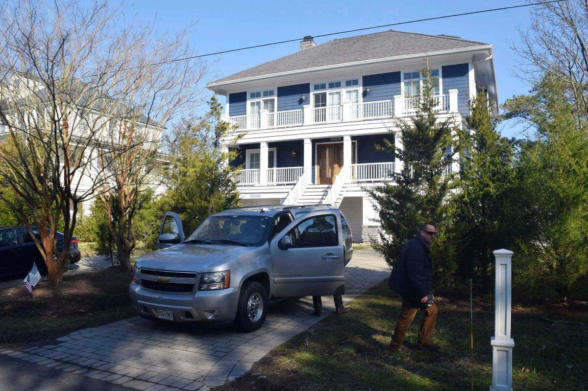 U.S. Secret Service agents are seen in front of President Joe Biden’s vacation home near Rehoboth Beach, Delaware, last year.
