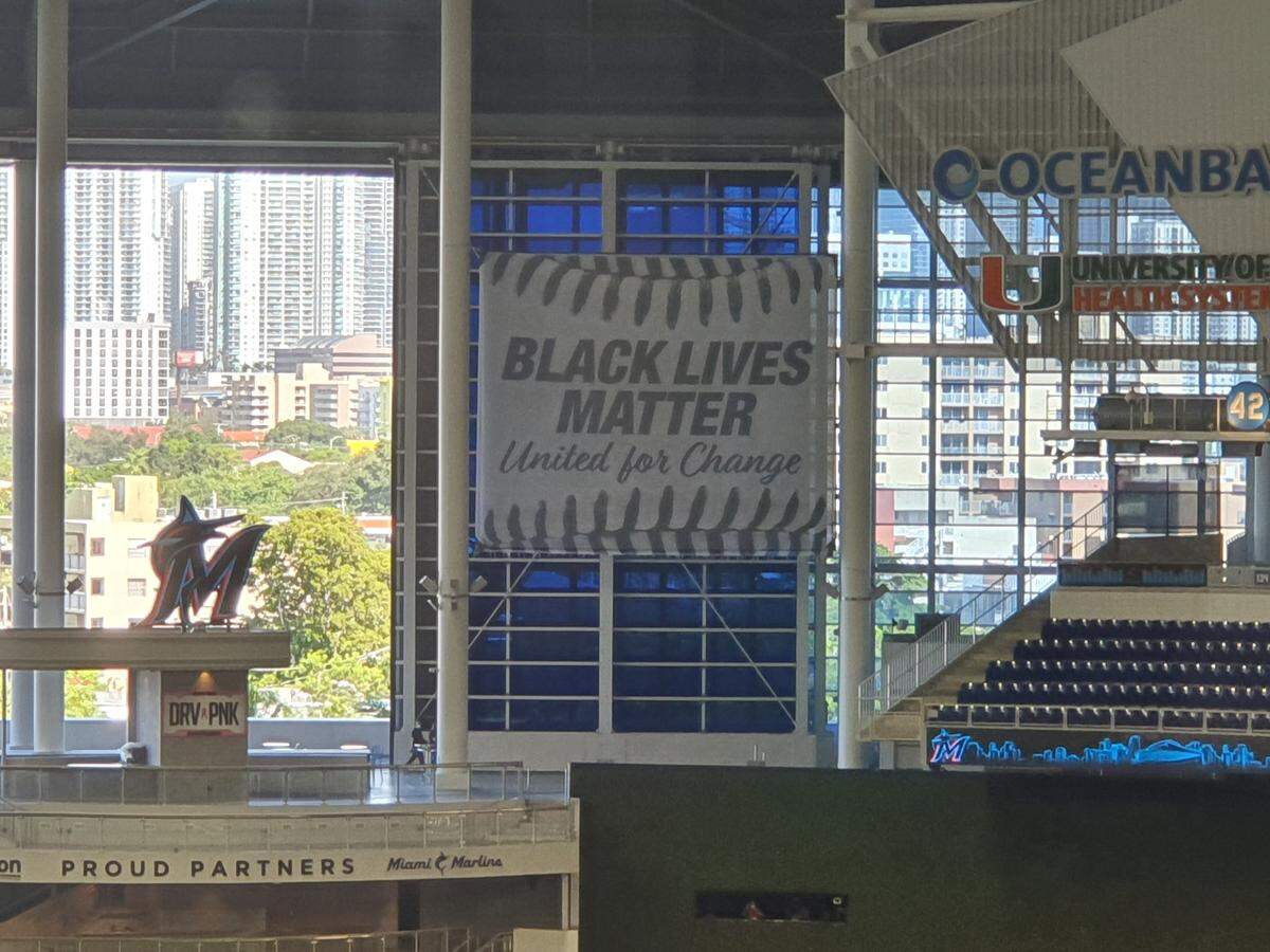 A Black Lives Matter banner hangs in left-center field at Marlins Park.