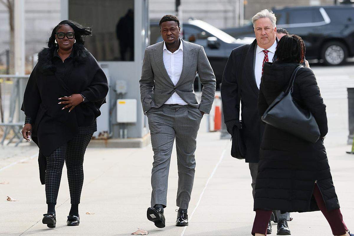 Miami Heat guard Terry Rozier (C) arrives for an arraignment hearing at U.S. District Court for the Eastern District of New York on December 08, 2025 in New York City.