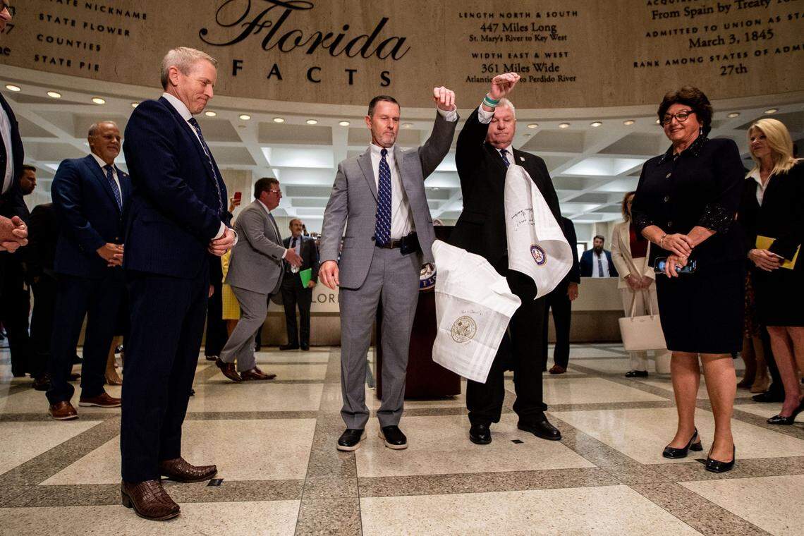 The sergeants-at-arms complete the traditional hanky drop that signifies the end of the legislative session in the rotunda of the Florida Capitol in Tallahassee on Friday, May 5, 2023. At left is House Speaker Paul Renner, and at right is Senate President Kathleen Passidomo.