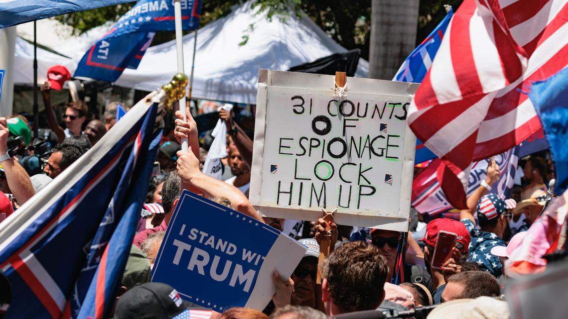 Trump has to weather new legal storm. Rivals turn critical, supporters rally behind him