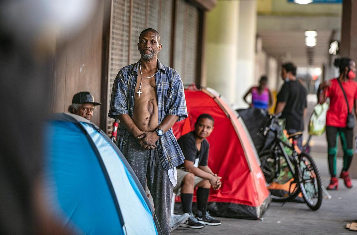 The Miami-Dade County Homeless Trust is teaming up with the Florida Division of Emergency Management to conduct vaccination tours throughout unsheltered homeless hot spots. Some homeless living on the sidewalk behind the former Macy’s store in downtown Miami have refused to be vaccinated by the medical staff visiting the homeless across Miami-Dade to ensure they have easy access to the COVID-19 vaccine, on May 21, 2021.