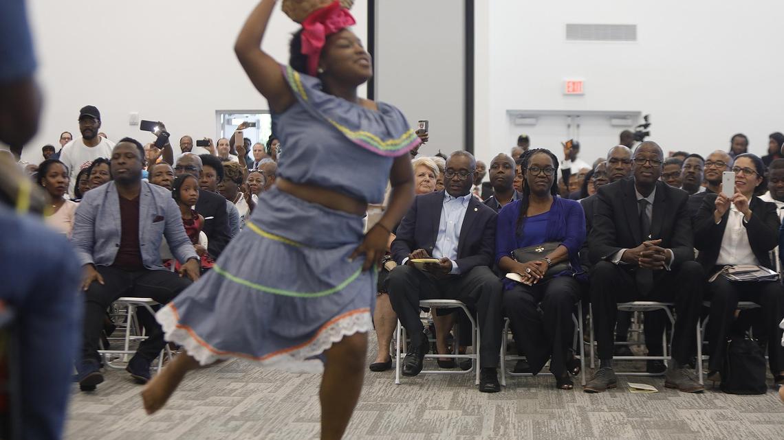 Miami-Dade County Commissioner Jean Monestime, District 2, his wife Kettia Monestime, and Deputy Mayor Maurice Kemps at the opening of the new Father Gérard Jean-Juste Community Center on Friday, April 5, 2019. The North Dade facility at Oak Grove Park was named in honor of the late Haitian cleric and immigration activist.