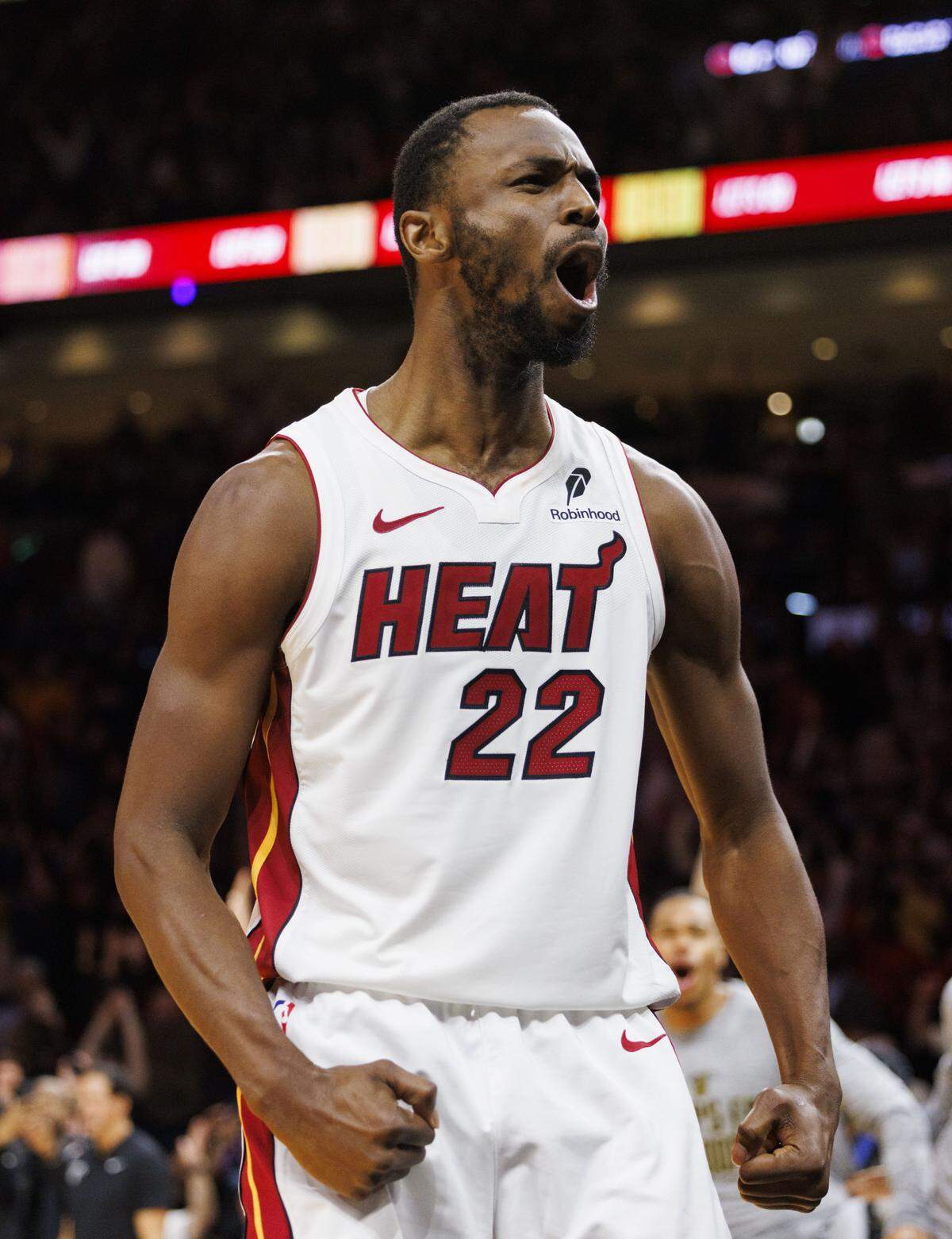 Miami Heat forward Andrew Wiggins (22) cheers after scoring the winning basket during overtime of a game against the Cleveland Cavaliers on Nov. 10, 2025, at Kaseya Center in Miami.