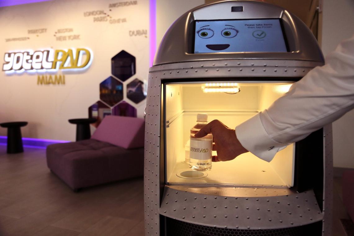 The robot has several different greetings and verbal responses and features a touch screen with various facial expressions. The device was available for review inside the YotelPad Miami sales gallery in downtown Miami, on Monday, August 27, 2018.