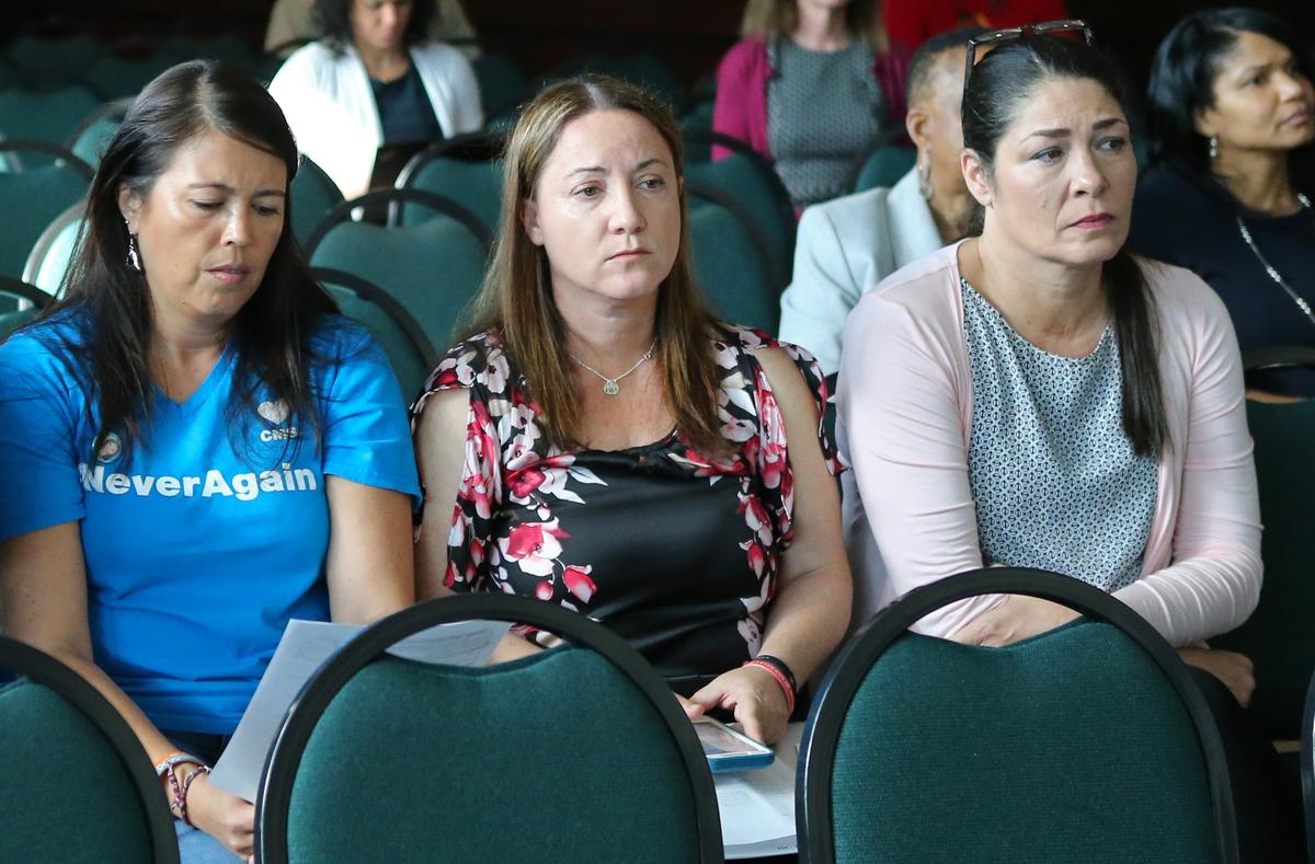 Lori Alhadeff, center, the mother of Parkland shooting victim Alyssa Alhadeff, looks on during the Marjory Stoneman Douglas High School Public Safety Commission Meeting at the BB&T Center on Thursday, June 7, 2018, in Davie.