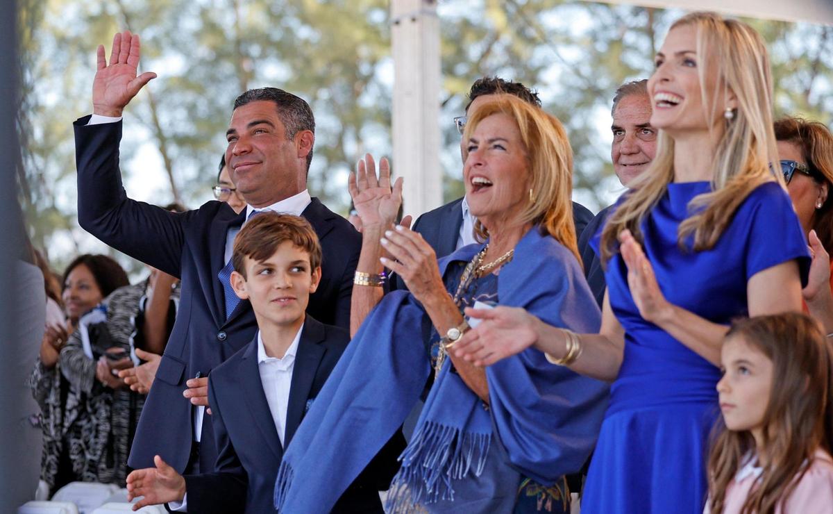 Miami Mayor Francis Suarez joins his family, son Andrew Suarez, mother Rita Suarez, wife Gloria Fonts Suarez and daughter Gloriana Suarez, left to right, after the mayor’s final State of the City address at the former Melreese golf course, the future site of Miami Freedom Park in Miami on Wednesday, Jan. 15, 2025.