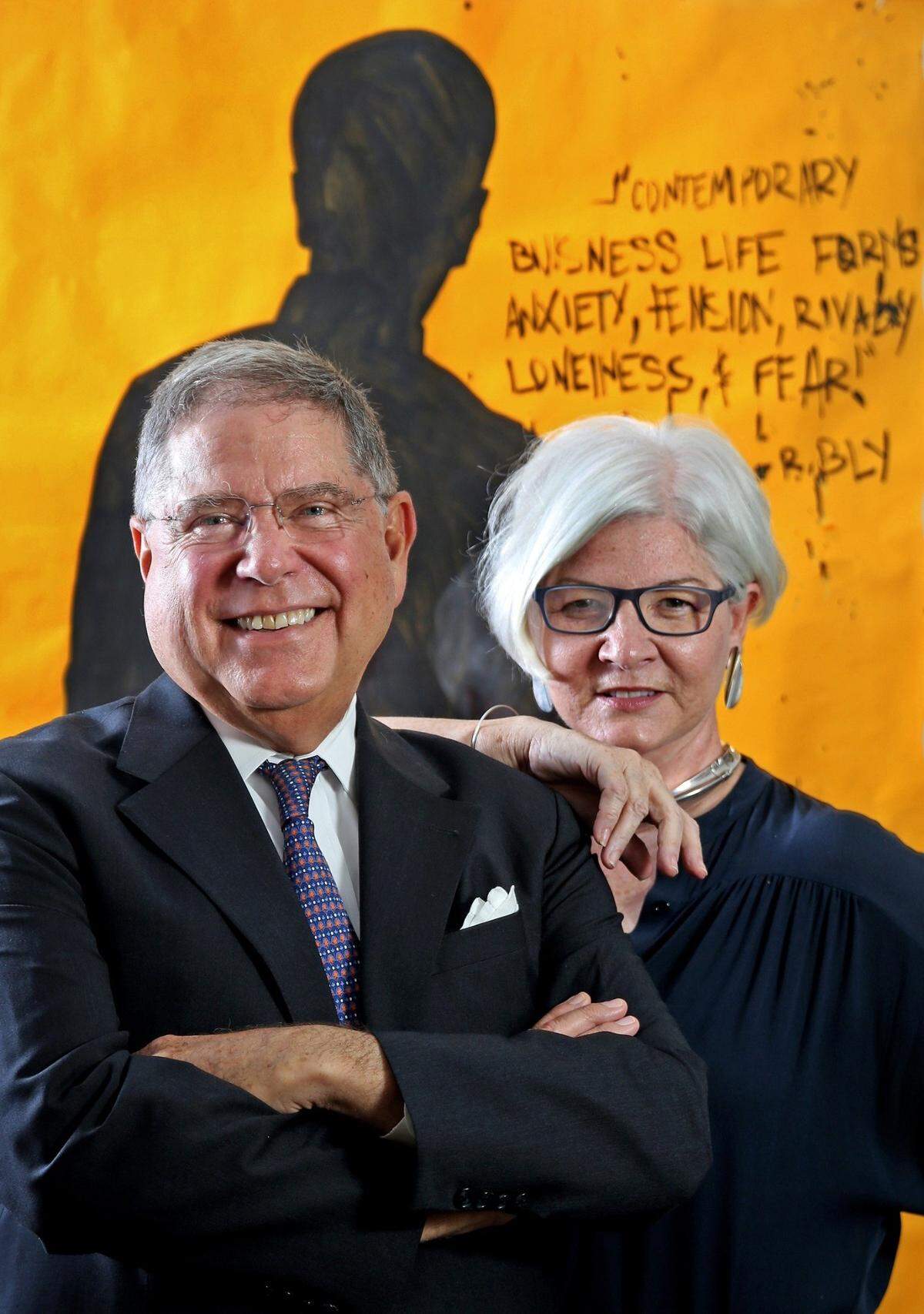 In this file photo from 2017, Alberto Ibarguen, then president and CEO of the John S. and James L. Knight Foundation, and Victoria Rogers, right, vice president of arts at Knight, are photographed at Knight Foundation’s Miami office as it celebrated the 10th year of the Knights Art Challenge.