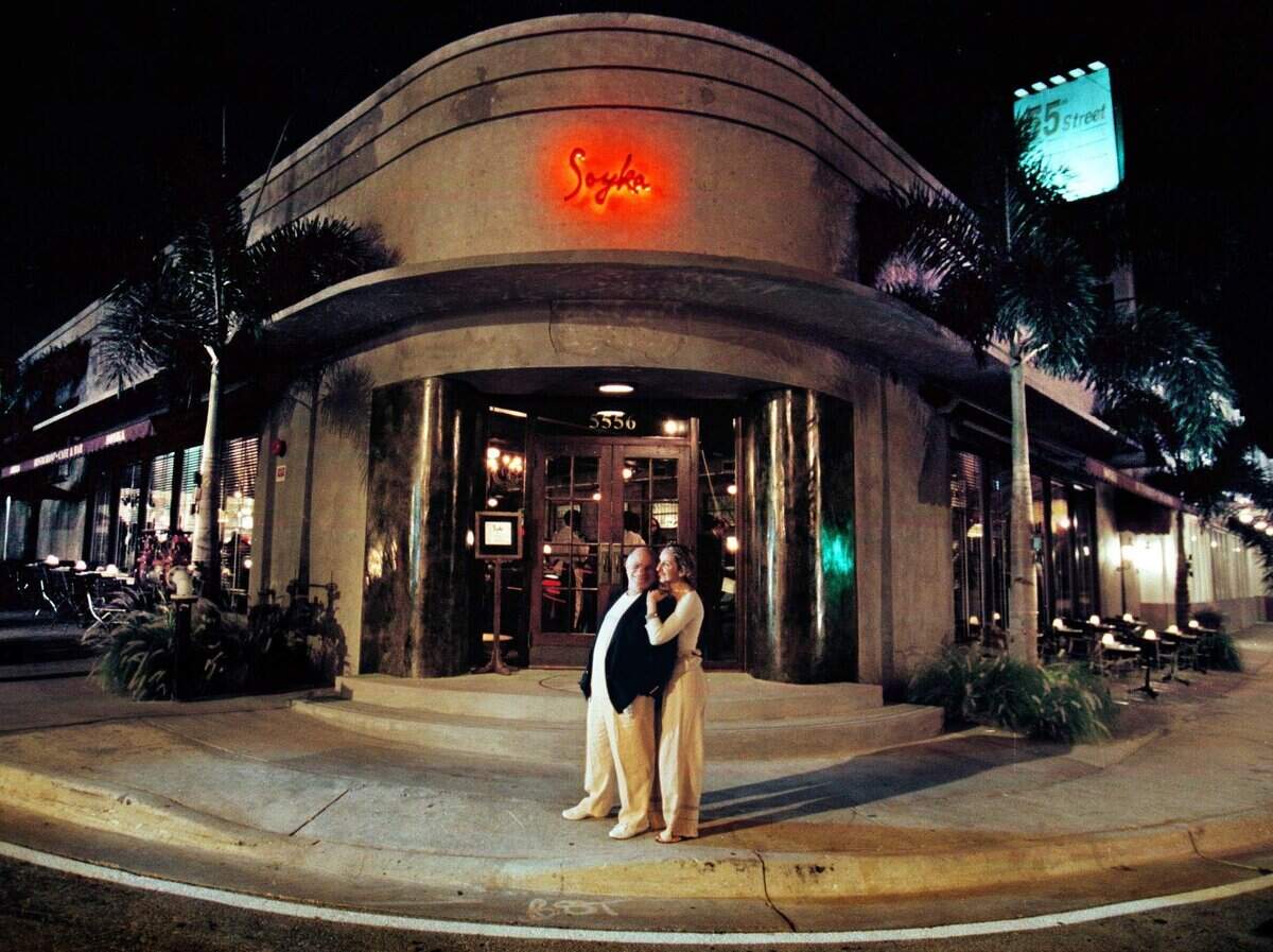 In this file photo from April 29, 1999, Mark Soyka and his wife Gabriele “Gabi” Soyka pose in front of their then-new restaurant on Biscayne Boulevard.