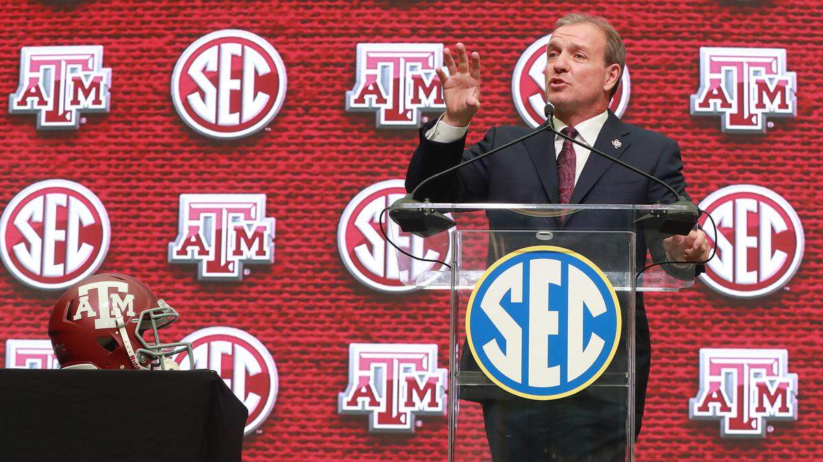 Texas A&M head coach Jimbo Fisher holds his SEC Media Days press conference at the College Football Hall of Fame on Monday in Atlanta.