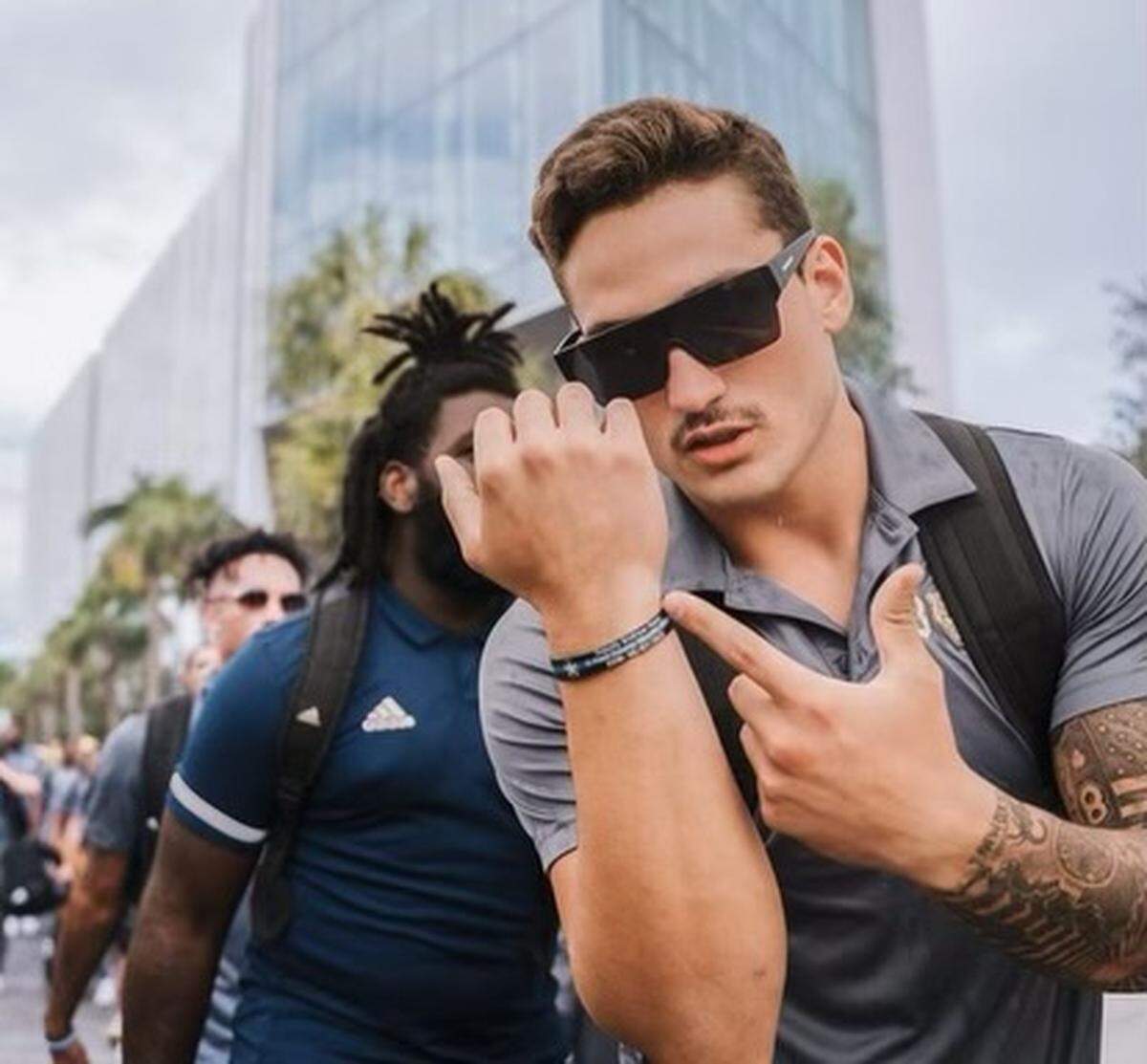 FIU backup quarterback Chayden Peery honors his uncle, Deputy Andrew Peery, a police officer who was killed in the line of duty in August of 2022, wearing a bracelet in his memory.