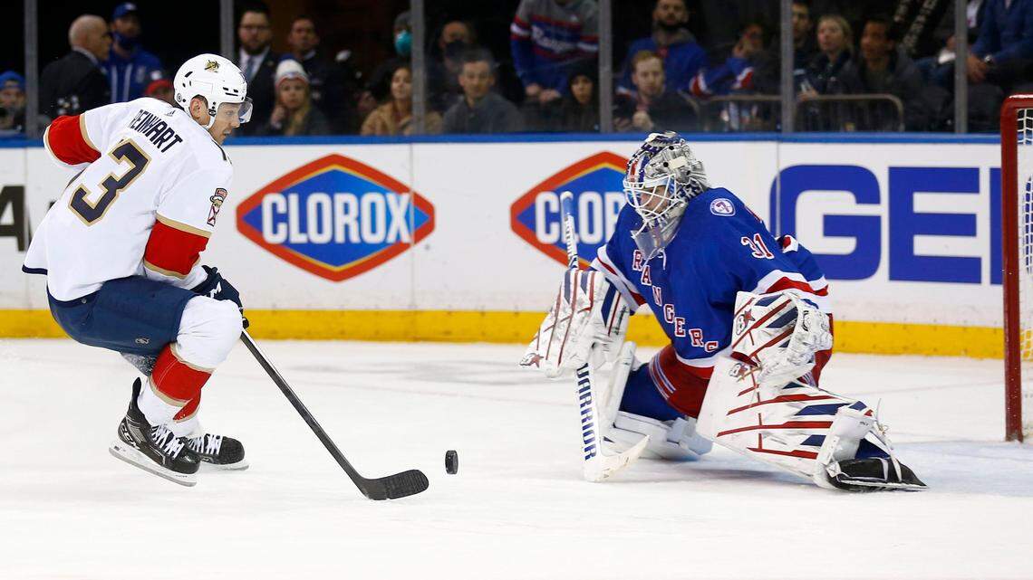 New York Rangers goalie Igor Shesterkin (31) makes a save on Florida Panthers’ Sam Reinhart (13) during the second period of an NHL hockey game Tuesday, Feb. 1, 2022, in New York. AP Photo/John Munson)
