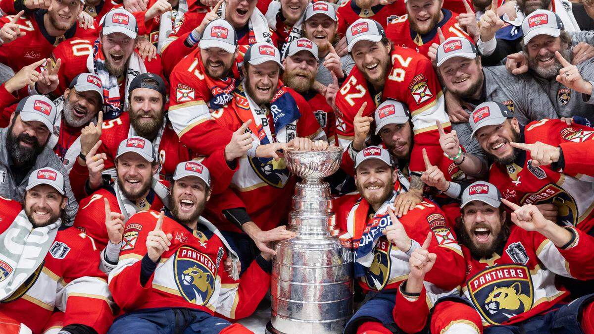 The Florida Panthers pose with the Stanley Cup after beating the Edmonton Oilers in Game 7 of the Stanley Cup Final at Amerant Bank Arena on Monday, June 24, 2024, in Sunrise, Fla.