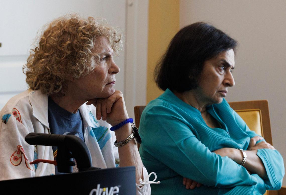 Celia Honig, left, and Reeta Raj listen during a conversation Series called “A Reverend and a Rabbi” organized by residents Reverend Priscilla Felisky Whitehead&nbsp;and Rabbi Ralph Kingsley at Vi at Aventura retirement home. 