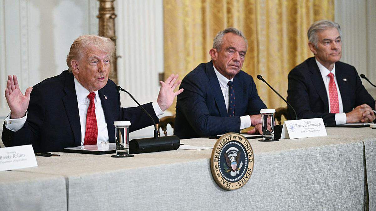 President Donald Trump speaks alongside Secretary of Health and Human Services Robert F. Kennedy Jr. and Medicare and Medicaid Administrator Mehmet Oz during a roundtable discussion on rural health care investments in the East Room of the White House in Washington, DC on Friday, Jan. 16, 2026.