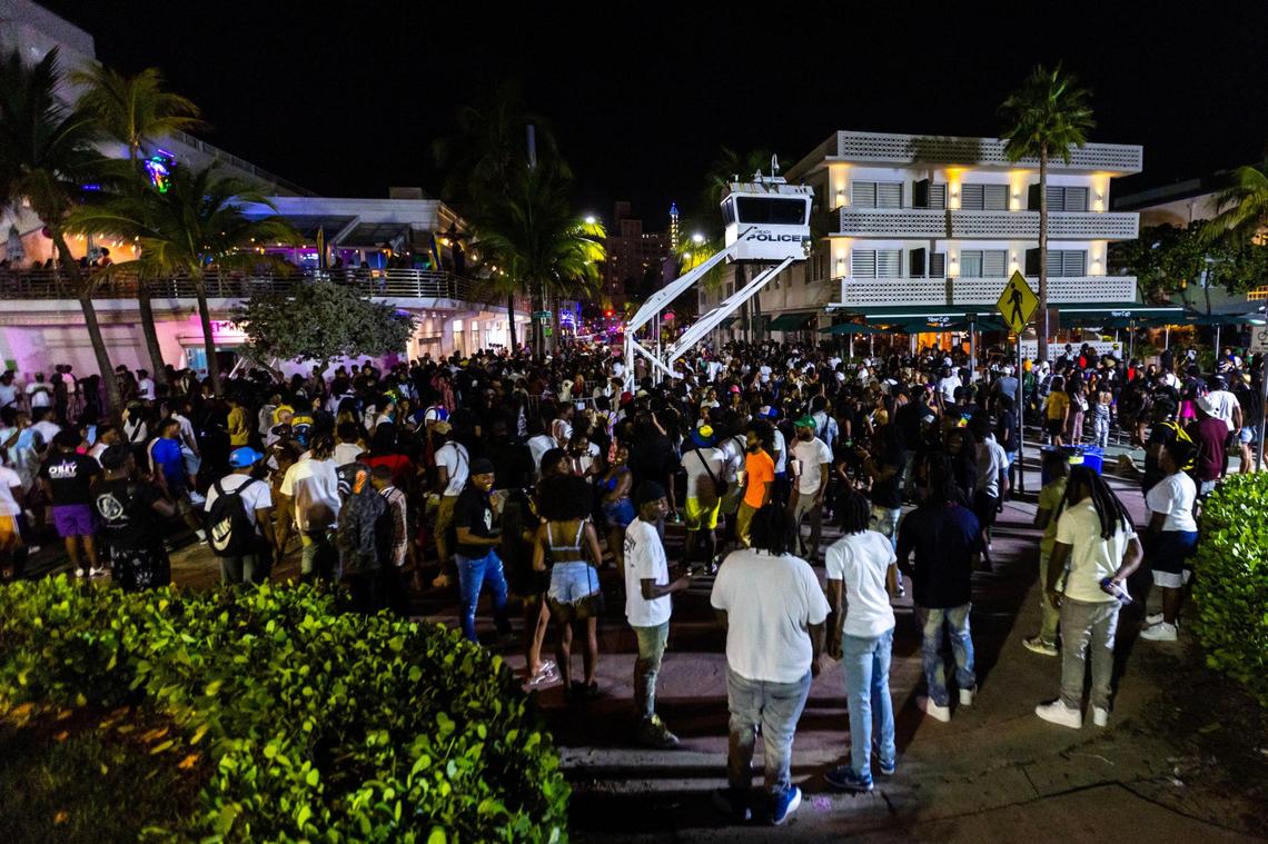 Crowds gather on Ocean Drive during spring break in Miami Beach on March 18, 2023.