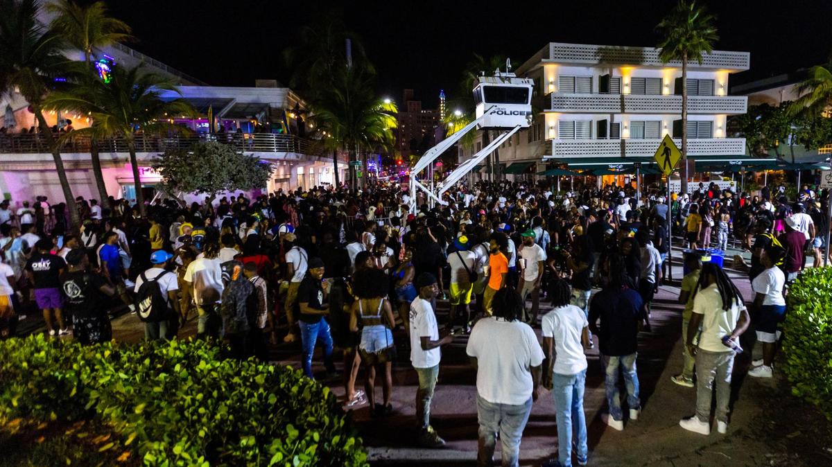 Crowds gather at Ocean Drive and Eighth during spring break in Miami Beach, Florida, on Saturday, March 18, 2023.