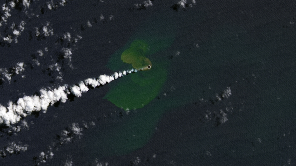 Activity from underwater volcanoes in the Pacific Ocean created a new island in Tonga; the island has grown as eruptions continue, satellites show.