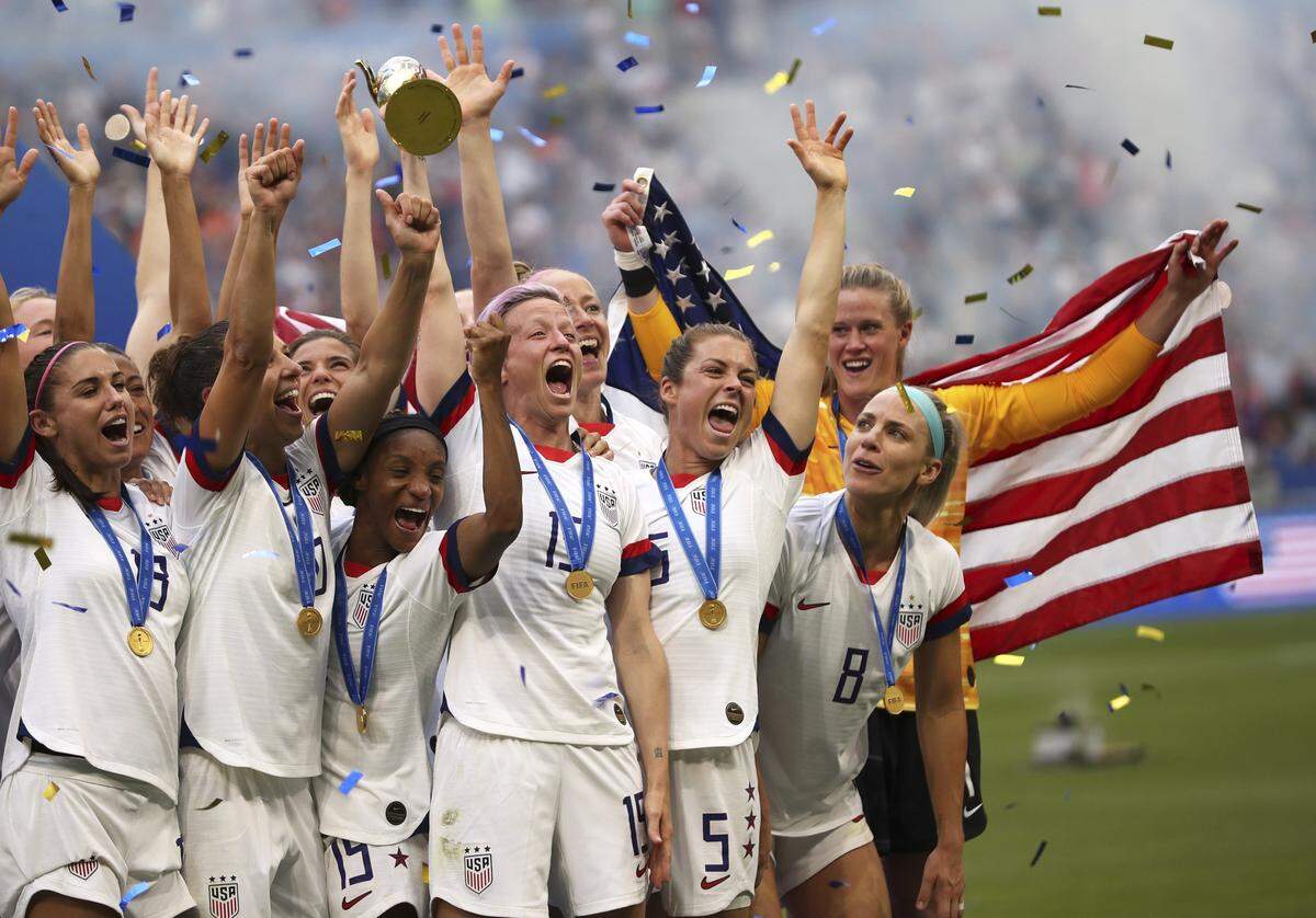 United States’ Megan Rapinoe holds the trophy celebrating at the end of the Women’s World Cup final soccer match between the U.S. and The Netherlands at the Stade de Lyon in Decines, outside Lyon, France, Sunday, July 7, 2019. The U.S. defeated the Netherlands 2-0.