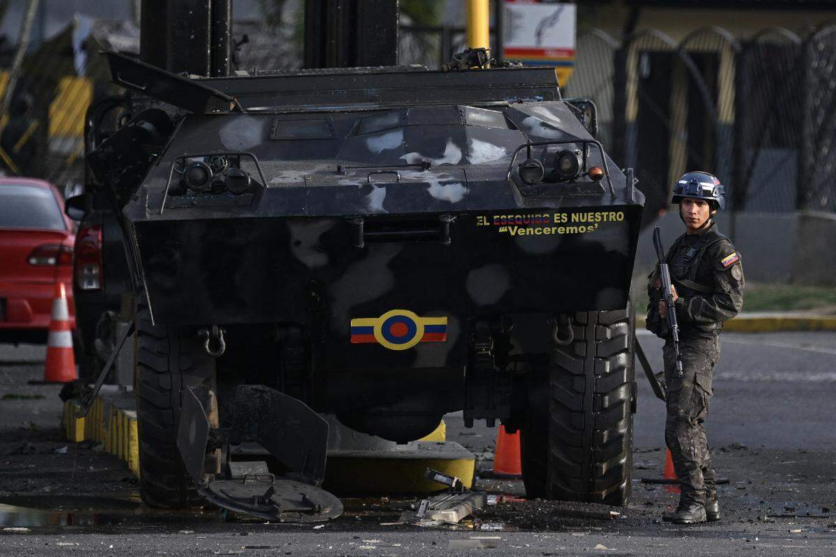 A member of the National Guard stands guard at Fuerte Tiuna, Venezuela's largest military complex, in Caracas on January 3, 2026, after US forces captured Venezuelan leader Nicolas Maduro after launching a "large scale strike" on the South American country.