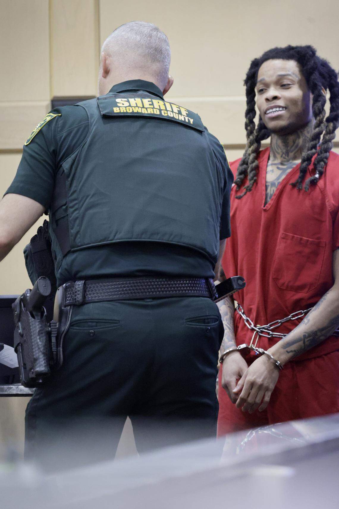 Cortlen Henry, known as the rap star YNW Bortlen, is fingerprinted in a Broward County courtroom in Fort Lauderdale on Tuesday, September 9, 2025. He plead no contest to accessory to murder in connection with the shooting deaths of YNW rappers Anthony “YNW Sakchaser” Williams and Christopher “YNW Juvy” Thomas Jr.. Prosecutors and investigators say Henry was the driver when Melly opened fire, then worked with Melly to make it look like a drive-by. (Mike Stocker/South Florida Sun Sentinel)