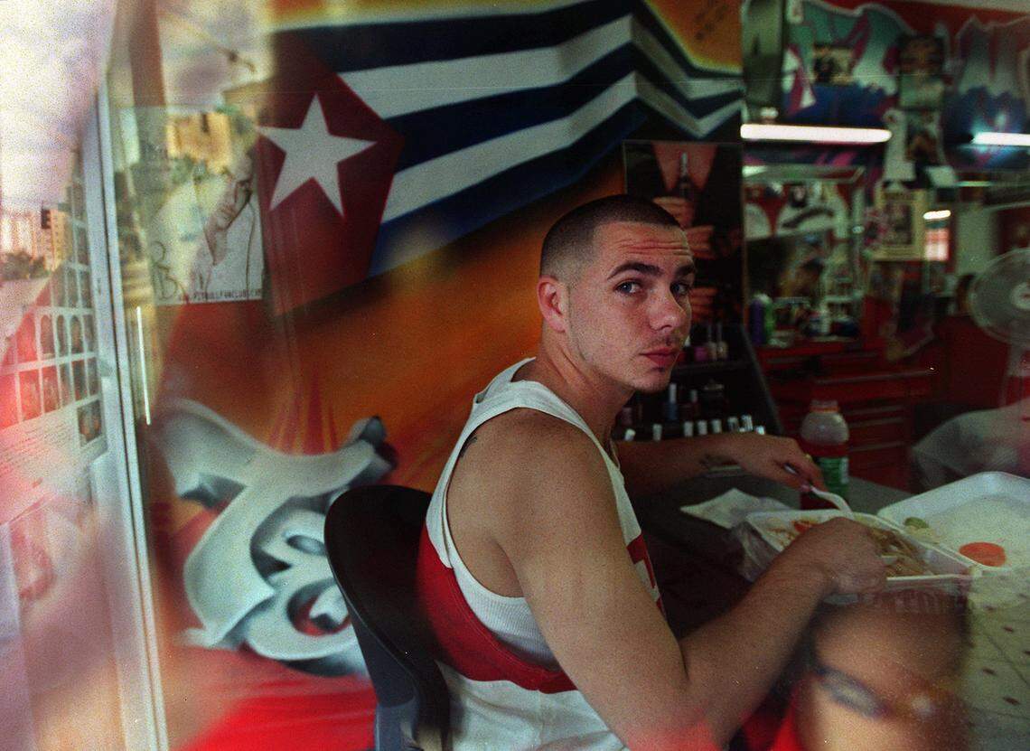 In 2003, Pitbull, at his favorite barber shop, a grafitti-walled Little Havana hub where he got a 12-dollar fade cut. Although he was unsigned at the time, his music was blowing up the radio charts.