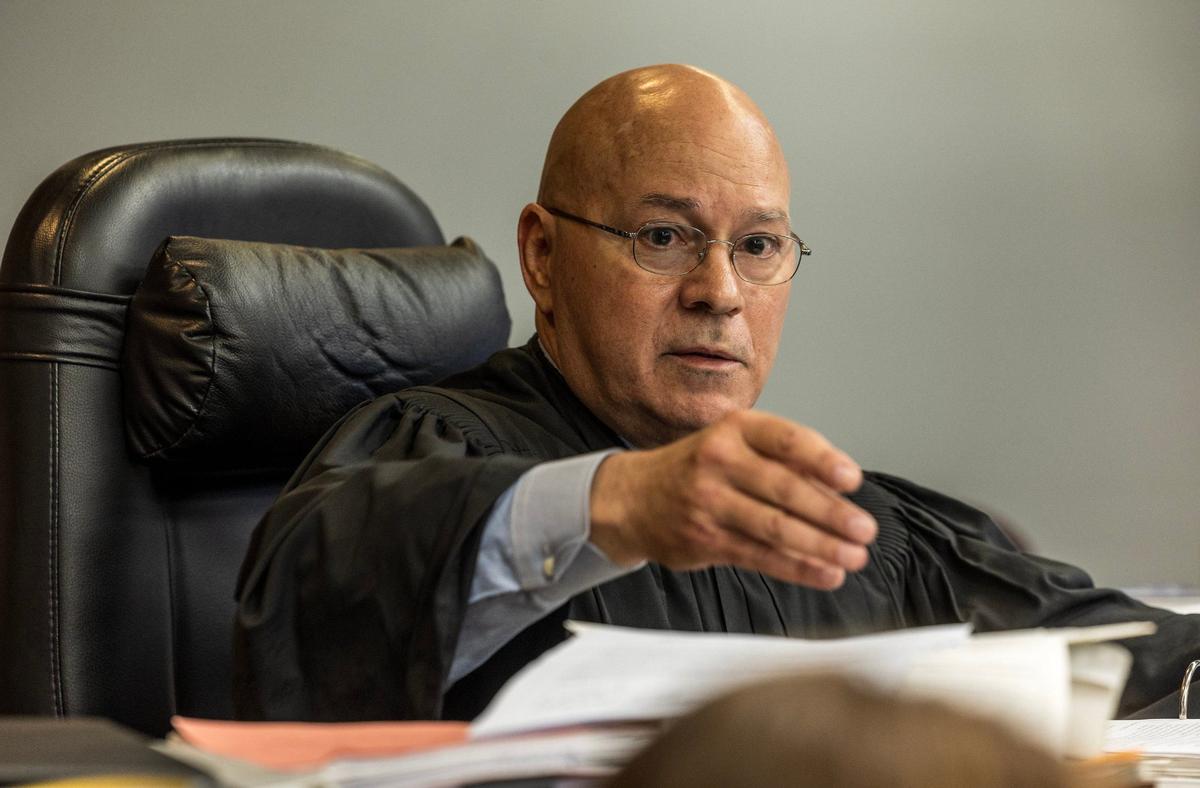 Judge Alberto Milian talks during Albert Bassett’s plea hearing at the Gerstein Justice Building in Miami on Tuesday, May 28, 2024. Basset was previously charged with four counts of sexual battery on a minor and three counts of lewd and lascivious conduct.