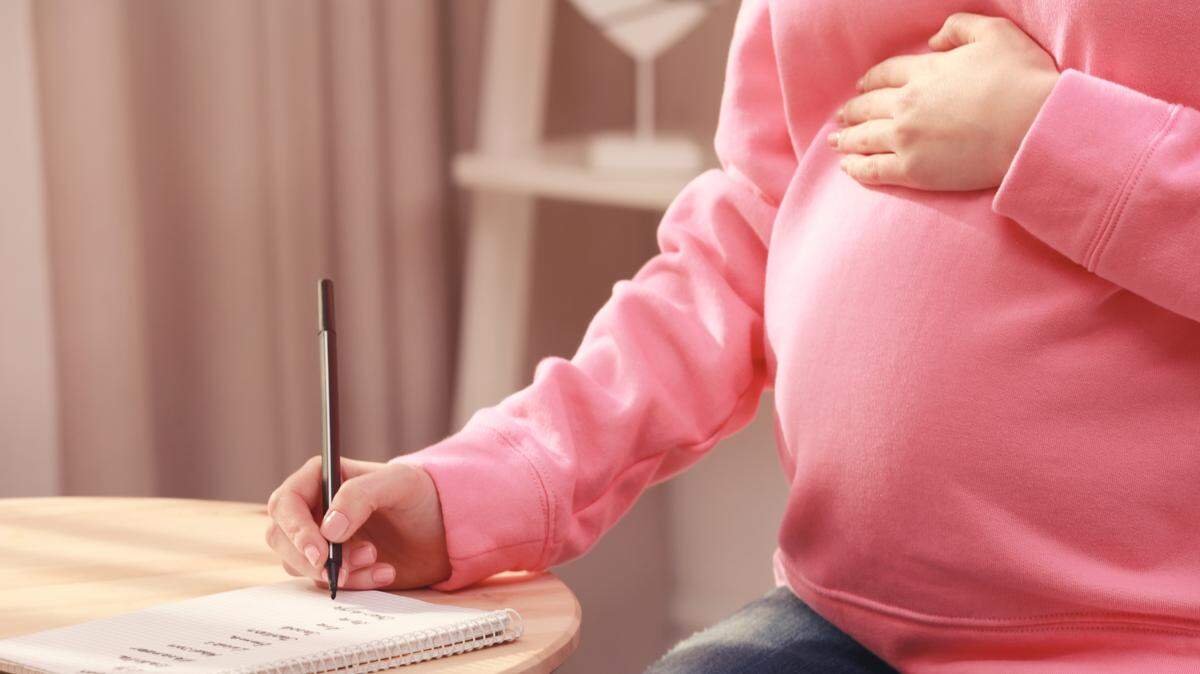 expecting mother making a baby name list
