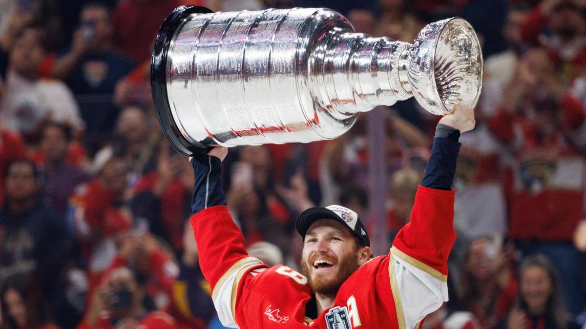 Florida Panthers left wing Matthew Tkachuk (19) lifts the Stably Cup after the Florida Panthers defeated the Edmonton Oilers in Game 6 winning the NHL Stanley Cup Final at Amerant Bank Arena on Tuesday, June 17, 2025 in Sunrise, Fla.