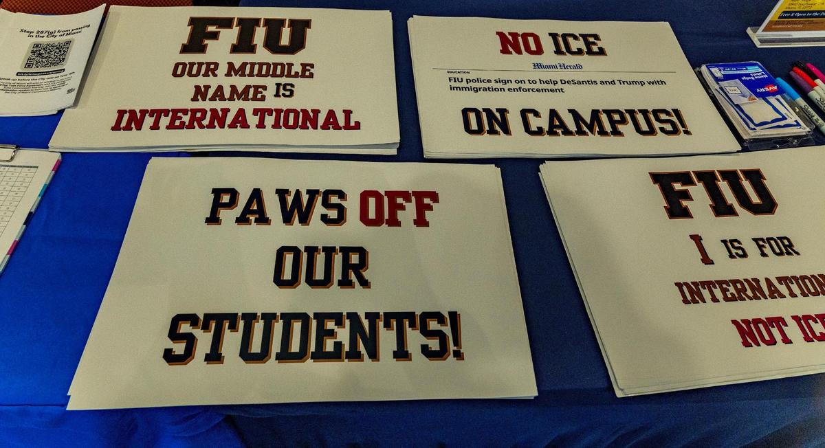 Posters attendees carried during a panel titled “Ice on Campus?” Immigration experts, FIU faculty and student leaders met with the chief of FIU’s police to discuss community concerns over the FIU Police collaborating with Immigration and Customs Enforcement.