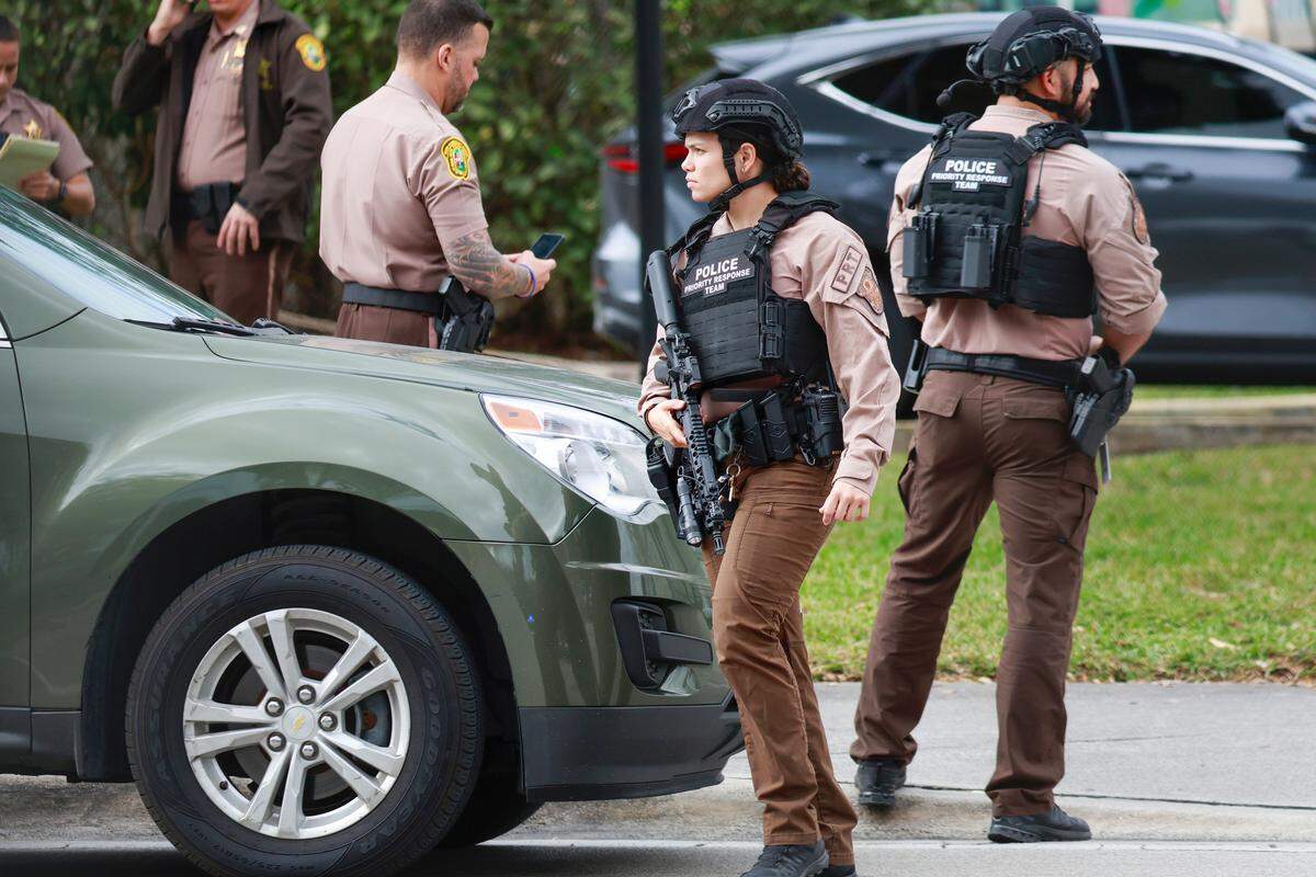 Miami-Dade Sheriff’s Office deputies respond to an active shooter call at Christopher Columbus High School on Southwest 87th Avenue on Wednesday, Feb. 4, 2026, in Miami. The sheriff’s office said, ‘There was no active shooter. No threat was found.’