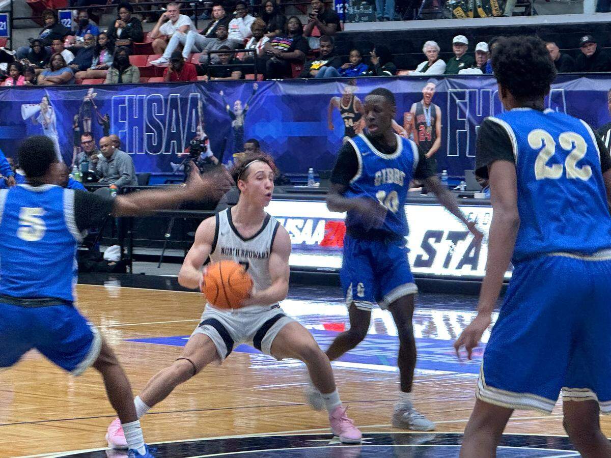 North Broward Prep’s Dylan Hoffman looks for an open teammate during Thursday’s Class 4A boys basketball state semifinal against St. Petersburg Gibbs at the RP Funding Center in Lakeland, Fla.