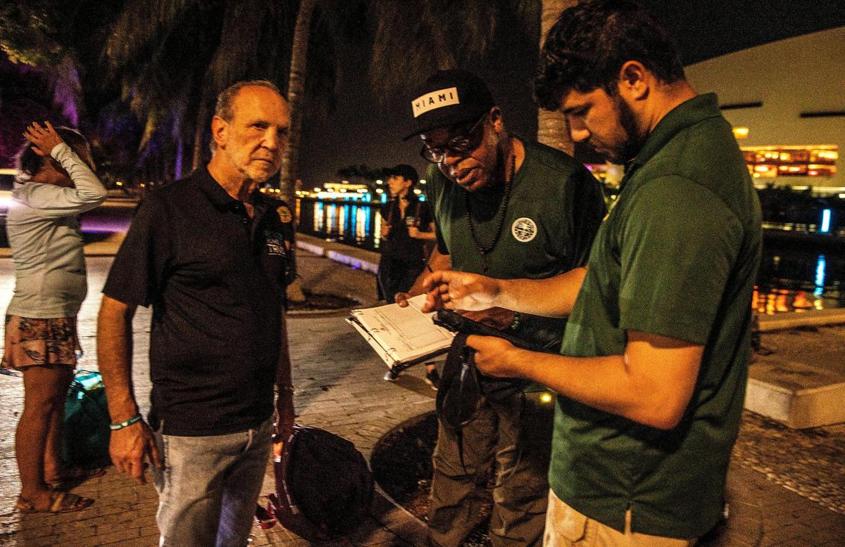 From left, Homeless Trust Chairman Ronald L. Book, joined City of Miami Outreach Specialists Ricky Leath and Christian Candelier at Museum Park during Miami-Dade County’s annual Point-in-Time (PIT) Homeless summer census.