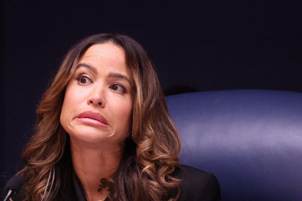 Commissioner Danielle Cohen Higgins reacts during a Miami-Dade County Commission meeting on Tuesday, Sept. 17, 2024, in Miami. Cohen Higgins, who represents Cutler Bay, opposed the purchase of the La Quinta hotel because of its price and was one of two commissioners who voted against the purchase.