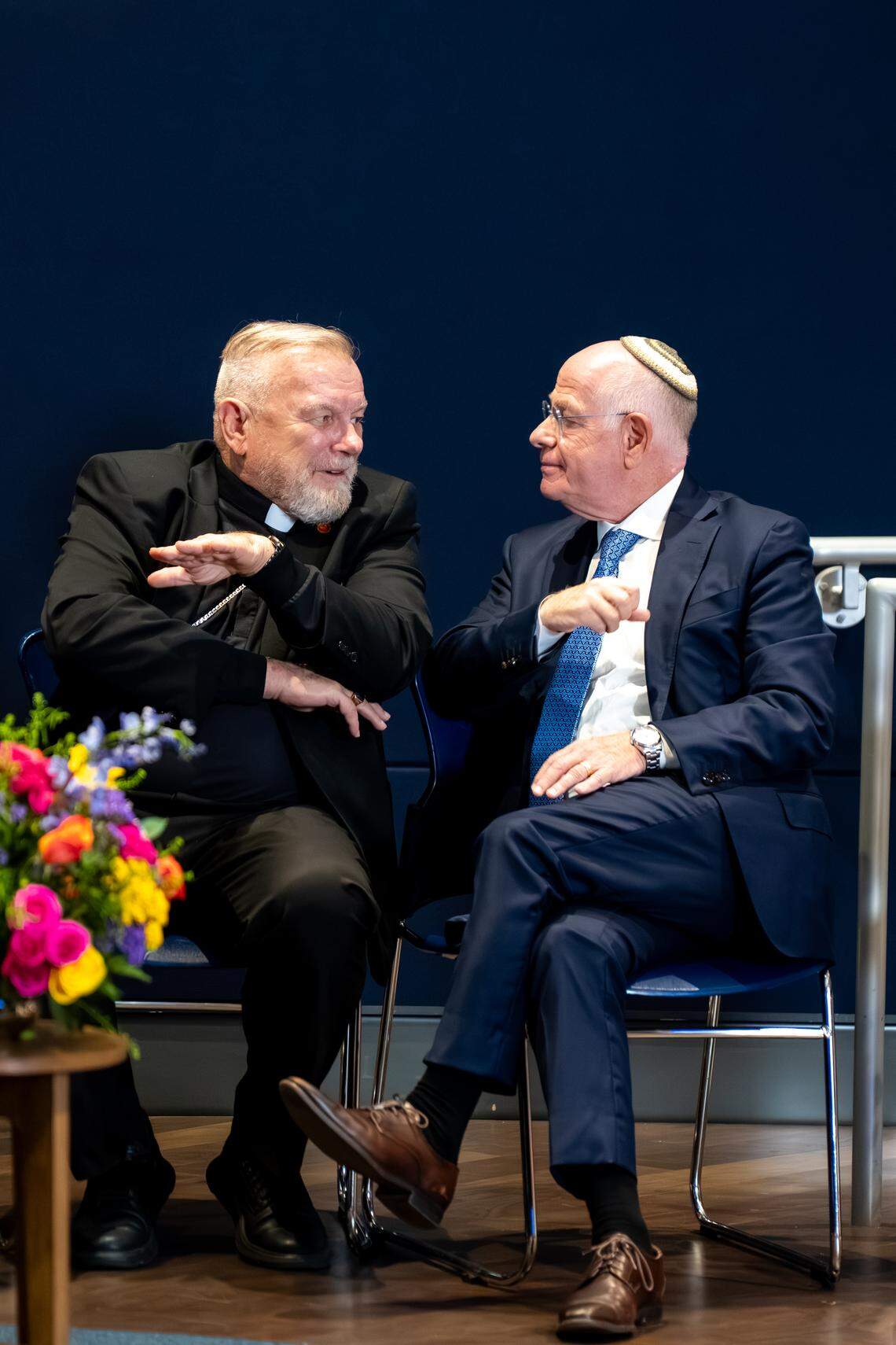 Miami Archbishop Thomas Wenski and Rabbi Mario Rojzman of Beth Torah Benny Rok Campus chat during an event at St. Thomas University celebrating the legacy of Catholic–Jewish relations in America.
