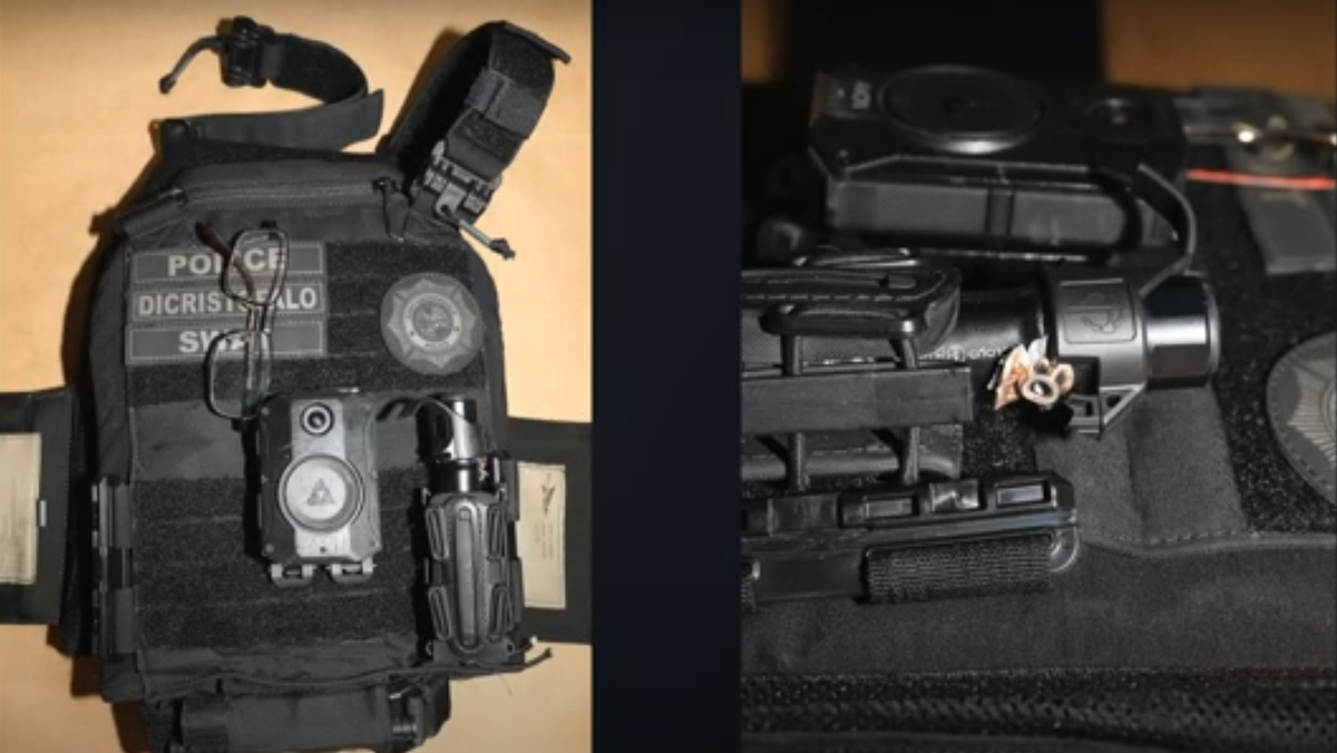 A photo provided by Fort Lauderdale police shows a bullet lodged in the vest of Officer Jack Dicristofalo.