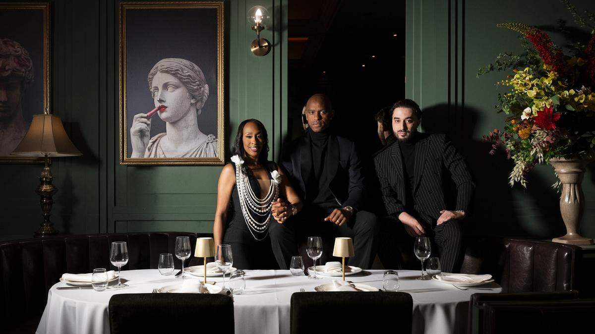 Igor Dze, center, pictured with his wife Libria Dze and restaurant co-owner Medhi Vanden Broeck in the dining room of the new Italian restaurant Leonardo in Miami Beach.