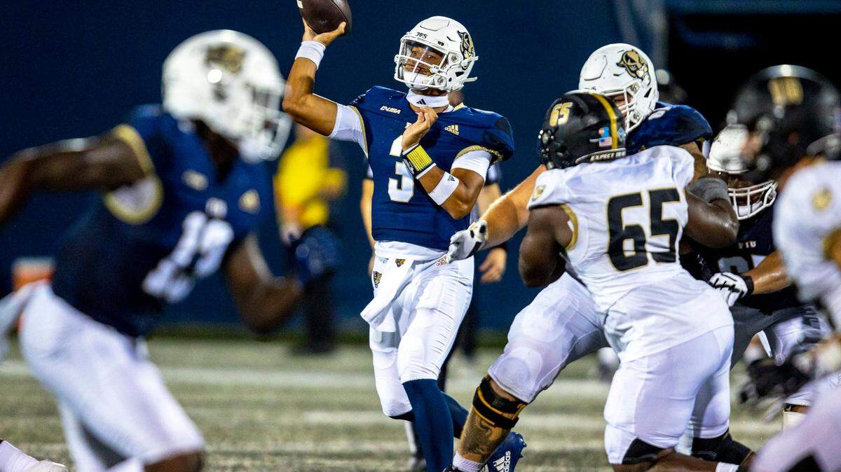 Florida International University quarterback Grayson James (3) throws the ball down field during the second half of an NCAA Conference USA football game against Bryant University at Riccardo Silva Stadium in Miami, Florida, on Thursday, September 1, 2022.