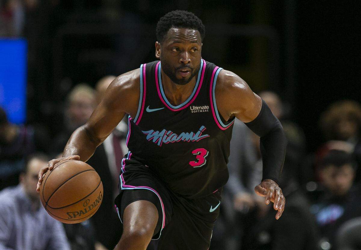 Miami Heat guard Dwyane Wade (3) drives the ball down the court in the fourth quarter as the Heat host the Milwaukee Bucks at the AmericanAirlines Arena on Saturday, Dec. 22, 2018.
