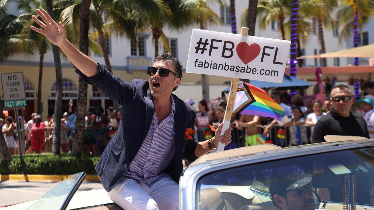 Florida Rep. Fabian Basabe waves to the crowd during the Miami Beach Pride parade on Sunday, April 16, 2023.