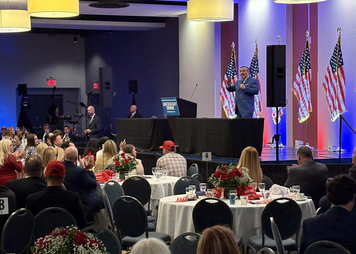 Senator Ted Cruz is on stage speaking to a crowd in Miami.