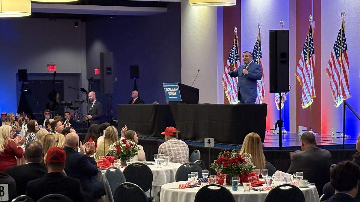 Senator Ted Cruz is on stage speaking to a crowd in Miami.