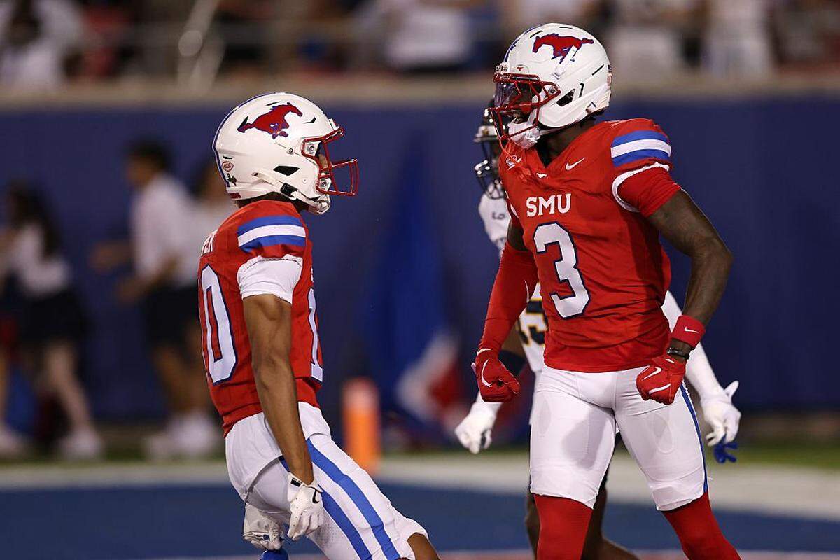 DALLAS, TEXAS - AUGUST 30: Romello Brinson #3 of the Southern Methodist Mustangs celebrates with Jalen Cooper #10 after scoring a touchdown during the first quarter of the game against the East Texas A&M Lions at Gerald J. Ford Stadium on August 30, 2025 in Dallas, Texas. (Photo by Sam Hodde/Getty Images)